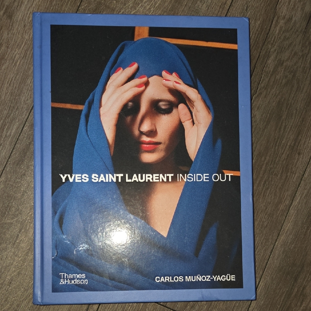 Yves Saint Laurent Blue Cover Book